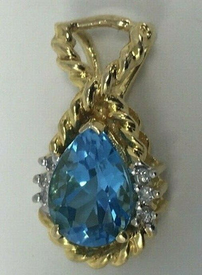 14 KT TOPAZ PENDANT BLUE STONE 3.2g